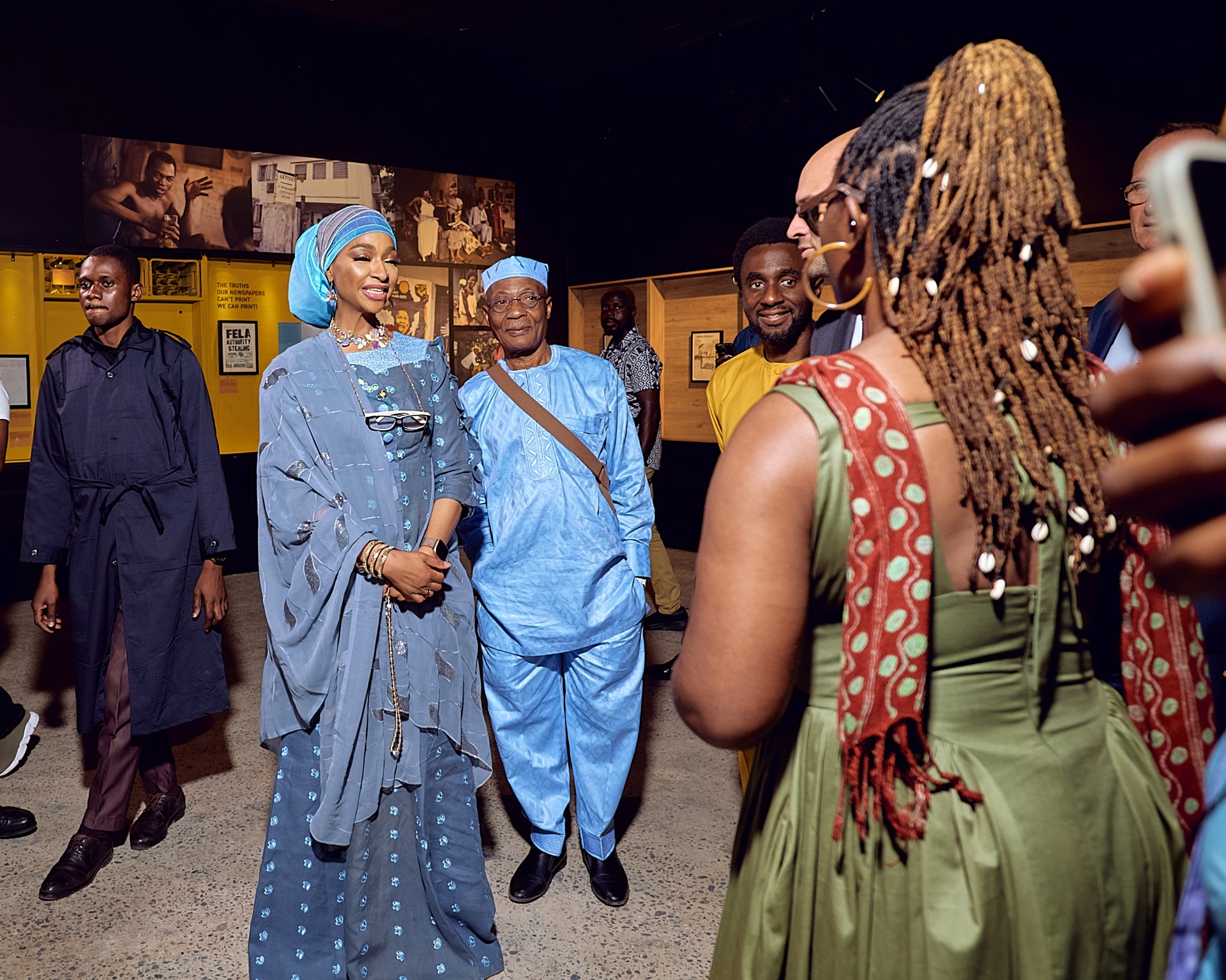 Kuti family members greeting guests inside the Afrobeat Rebellion exhibition
