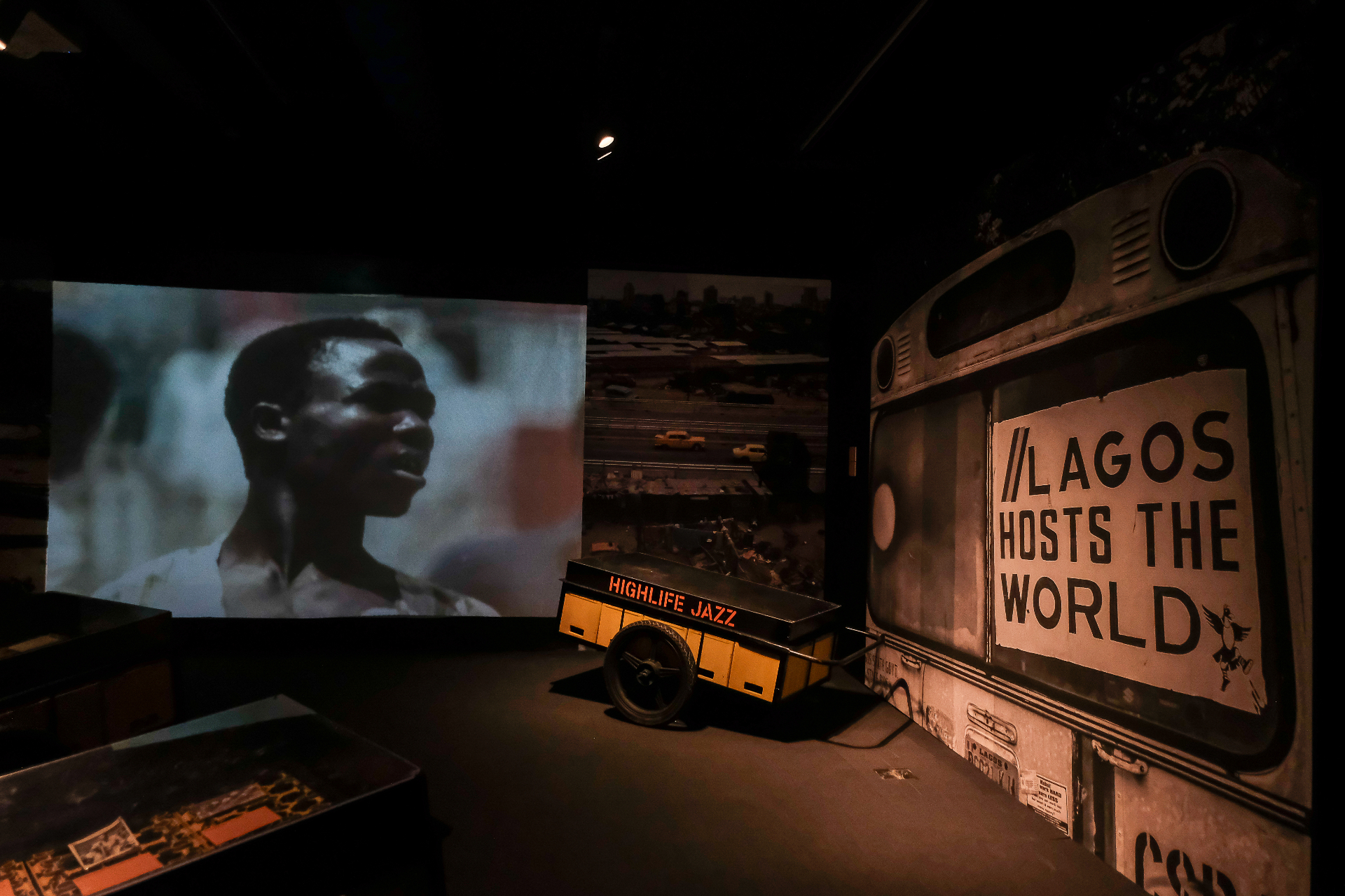 Lagos Hosts The World installation with archival Fela projection, Highlife Jazz pushcart and repurposed danfo bus at Afrobeat Rebellion